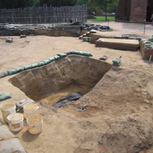 Excavation unit lined with sandbags