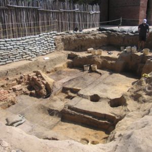 Excavated cellar lined with sandbags