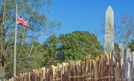 The King's Colours, the Tercentennial Monument, and the newly-rebuilt palisade wall.