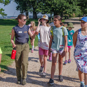 Staff Archaeologist Natalie Reid leads a tour of Jamestown on the first day of Kids Camp.