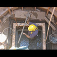 Director of Archaeology David Givens discovers the halberd in James Fort's second well.