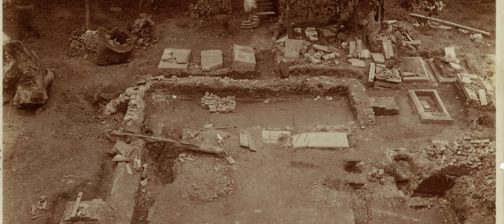 sepia photograph of churchyard excavations